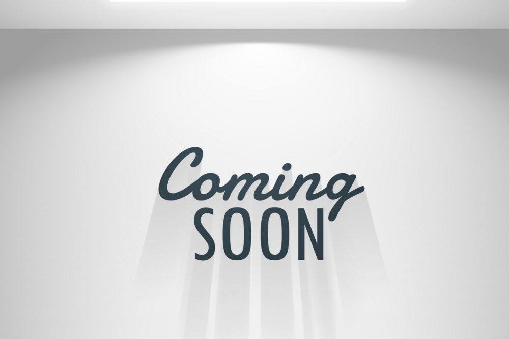 white room with light and coming soon text